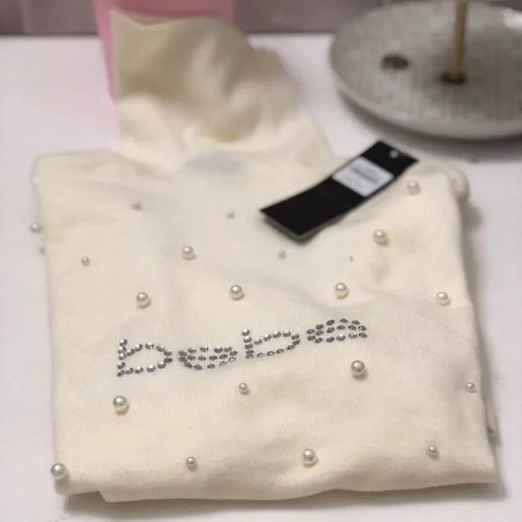 . NWT BEBE AUTHENTIC WOMENS MARSHMALLOW PEARLS TURTLE NECK SHORT SLEEVE … - Picture 2 of 4
